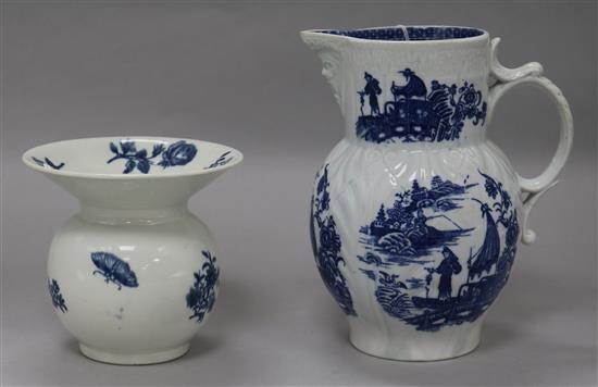 A Caughley blue and white floral spittoon, c.1780 and a Caughley fisherman and cormorant pattern mask jug, height 12cm and 18cm